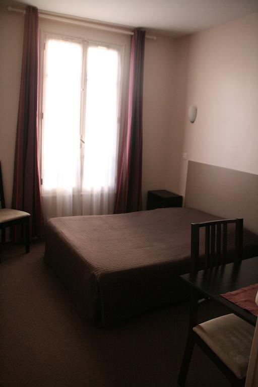 Hotel Du Roussillon Paryż Pokój zdjęcie